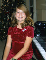 girlbypianoinred.jpg